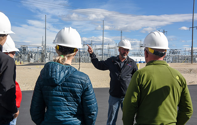 Employees tour the Dave Gates Generating Station